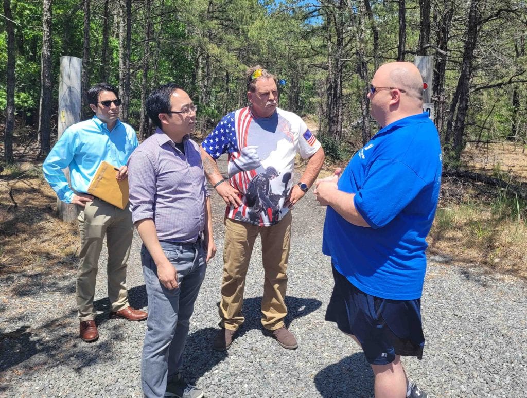 Andy Kim explores the property on Rt. 72 in Brigantine where Jeff's Camp will be located.
